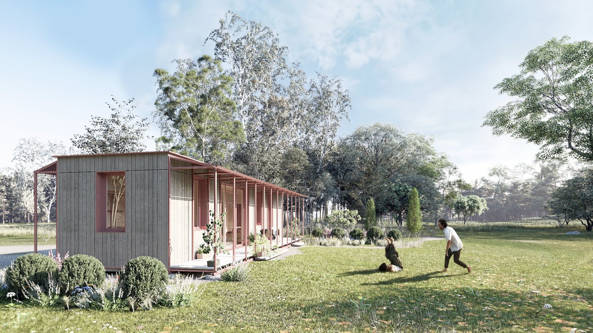 little-BIGS-Haus in einer Wiese unter hohen Bäumen, davor zwei Menschen beim Spielen